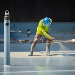 A,Male,Worker,Holding,An,Industrial,Spray,Gun,Used,For