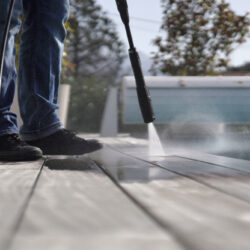 Man,Using,High,Pressure,Washer,Cleaning,Deck