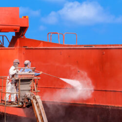 Worker,Washing,In,Dry,Dock,With,Water,Jet,Cleans,The
